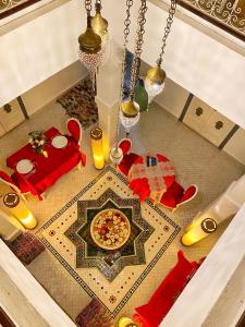 a table with a plate of food on a table at Riad Kech Soul Boutique & Spa in Marrakesh
