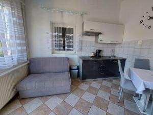 Kuchyňa alebo kuchynka v ubytovaní Apartments Bernarda