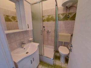 Kúpeľňa v ubytovaní Apartments Bernarda + 24 fotografií