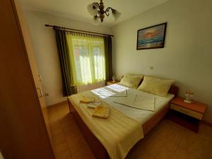 Posteľ alebo postele v izbe v ubytovaní Apartments Bernarda