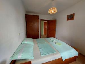 Posteľ alebo postele v izbe v ubytovaní Apartments Bernarda