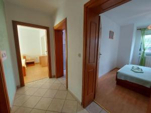 Posteľ alebo postele v izbe v ubytovaní Apartments Bernarda