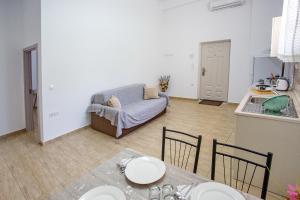 A bed or beds in a room at HAROULENA
