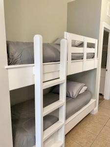 a couple of bunk beds in a room at 122 Seascape Dr Unit 1406 in Destin