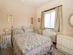 Katil atau katil-katil dalam bilik di The Cottage at Moseley House Farm