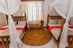 Cama o camas de una habitación en Villa Poa