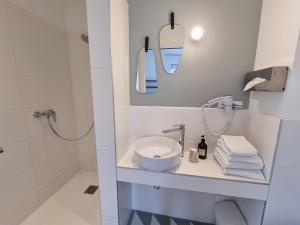 Um banheiro em Hotel De L'Europe