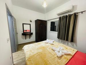 Cama ou camas em um quarto em Elite Residence Dahab