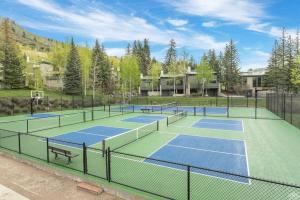 a group of tennis courts in a park at Red Sandstone Condo Unit 26 in Vail
