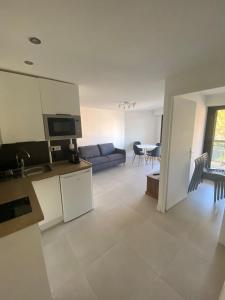 Køkken eller tekøkken på Frejus Plage Acapulco + 2 billeder