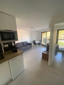 Køkken eller tekøkken på Frejus Plage Acapulco