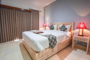 Postel nebo postele na pokoji v ubytování Adi Guest House
