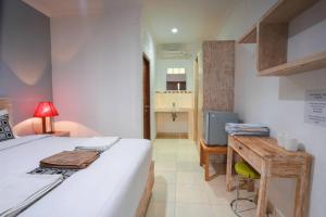 Postel nebo postele na pokoji v ubytování Adi Guest House