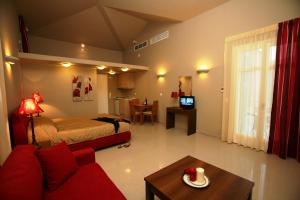 TV a/nebo společenská místnost v ubytování Armonia Resort