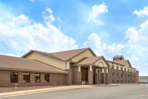a rendering of the front of a building at AmericInn by Wyndham Ottumwa in Ottumwa