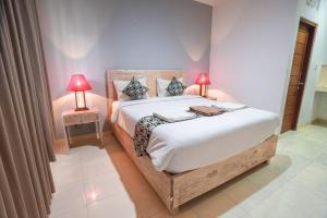 Postel nebo postele na pokoji v ubytování Adi Guest House