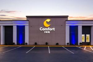 a building with a c content firm sign on it at Comfort Inn in Kings Mountain