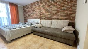 Posteľ alebo postele v izbe v ubytovaní Dalma Apartment