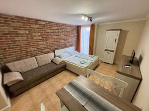 Posteľ alebo postele v izbe v ubytovaní Dalma Apartment