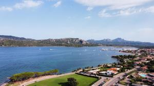 an aerial view of a bay with boats in the water at Acqualife 4 luxury home in Arzachena