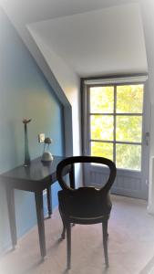 Posezení v ubytování Les 7 Tilleuls - Chambres d'hôtes