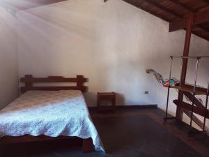 En eller flere senger på et rom på Sobrado Estiloso