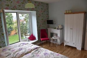 Ένα ή περισσότερα κρεβάτια σε δωμάτιο στο Annettes Pfalz