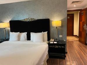 Barceló Cairo Pyramids 객실 침대