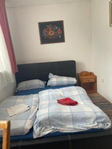 Postel nebo postele na pokoji v ubytování Haus Zauberwald