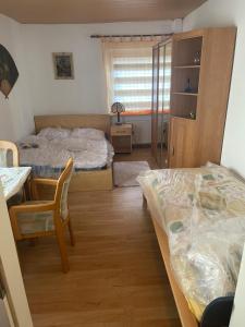 Postel nebo postele na pokoji v ubytování Haus Zauberwald + 22 fotografií