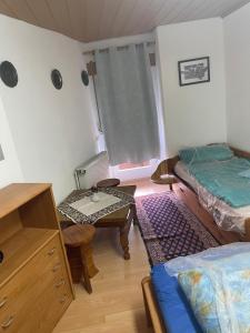Postel nebo postele na pokoji v ubytování Haus Zauberwald