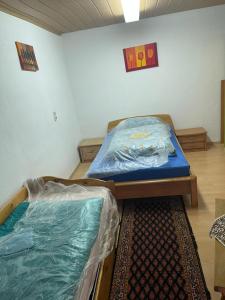 Postel nebo postele na pokoji v ubytování Haus Zauberwald