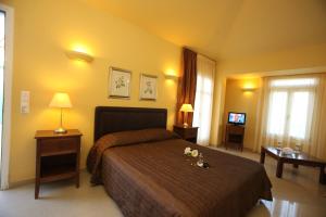 Postel nebo postele na pokoji v ubytování Armonia Resort