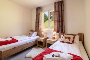 Кровать или кровати в номере Chalet Hannegg Penthouse