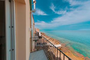 En balkong eller terrasse på Suite Bordonaro Luxury Apartments