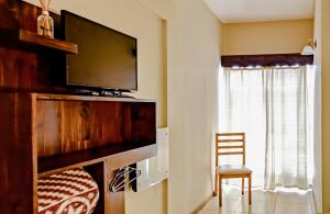 A kitchen or kitchenette at Hotel El Paraiso De La Sierra