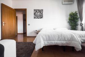 A bed or beds in a room at Appartamento di design