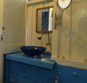 a bathroom with a bowl sink and a mirror at Phayam Friends in Ko Phayam +83 photos