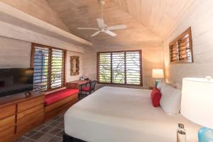 Voodi või voodid majutusasutuse Barefoot Cay Resort toas