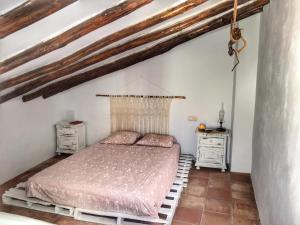 Posteľ alebo postele v izbe v ubytovaní Casa Juncaria