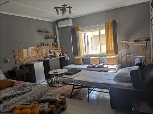 Prostor za sedenje u objektu Koa Studio Apartment