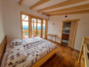 Säng eller sängar i ett rum på Panorama glamping Vipavska dolina