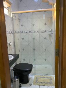 Ванна кімната в Suites Flor de Lis