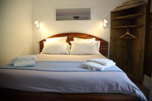 Кровать или кровати в номере Hotel du Cap