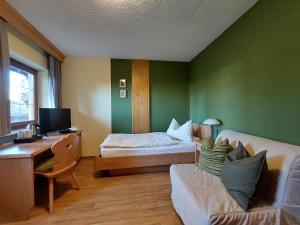 Een bed of bedden in een kamer bij Landgasthof Neitsch