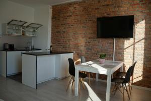 Η κουζίνα ή μικρή κουζίνα στο Apartament Gliwice Centrum Witkiewicza II