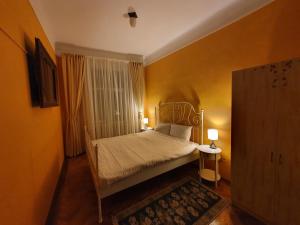 Postel nebo postele na pokoji v ubytování Chic Studio Brasov