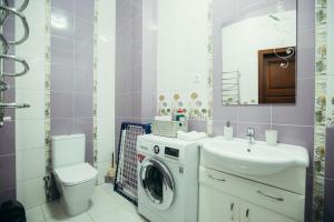 Ванная комната в Vodogray apartments +15 фотографий