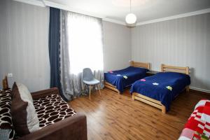 Ένα ή περισσότερα κρεβάτια σε δωμάτιο στο Green Tianeti