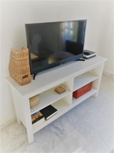 TV a/nebo společenská místnost v ubytování El Envero Apartamento
